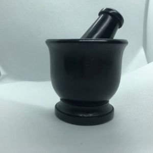 Black soap stone mortar and pestle.